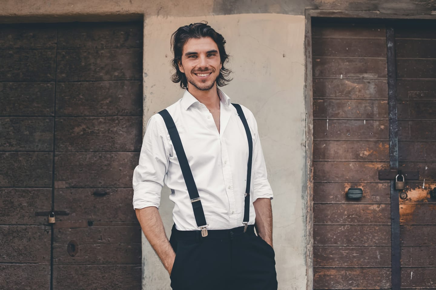 Accessories manufacturing context: formal braces worn with a dress shirt