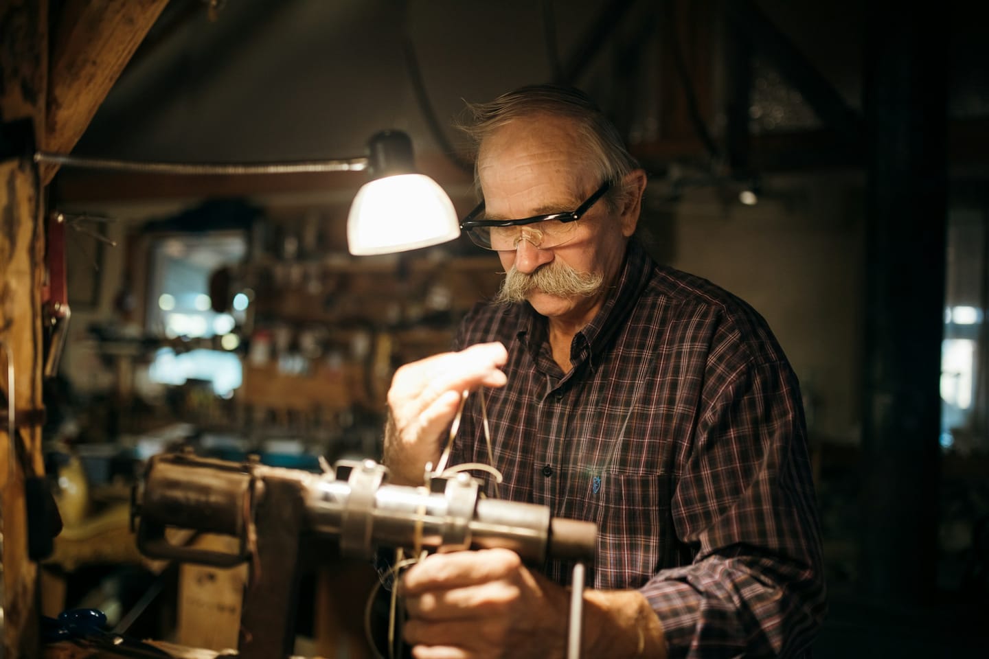 Workshop imagery: a leather workshop bench with tools and material
