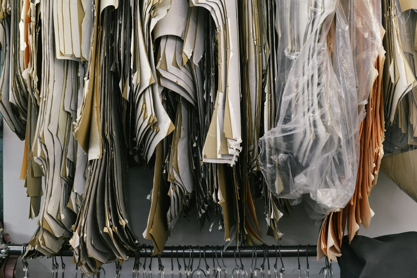 Workshop imagery: leather hides stored in a workshop